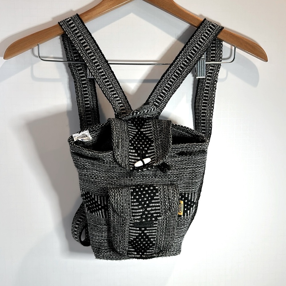 Emisa Made in Mexico woven backpack purse drawstring close & front zip pocket.